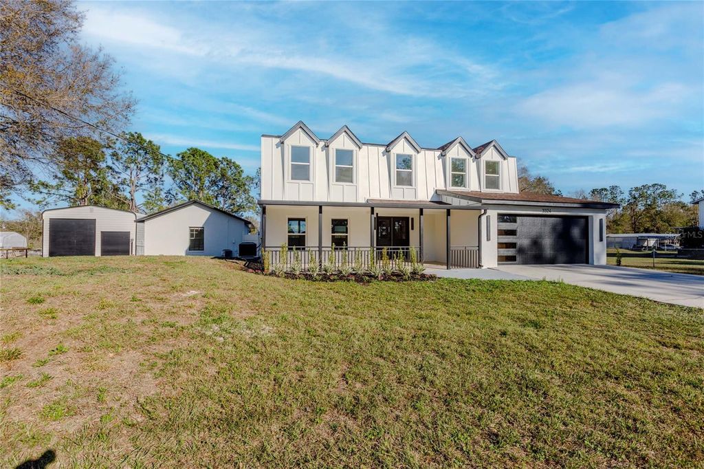 Photo of 3324 Haystack Road, Wesley Chapel, FL 33543 (MLS # O6385931)