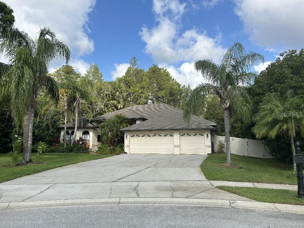 Serene lake, great location, beautiful private lot on cul-de-sac, open floor plan made for entertaining! This house has it all! Rural living in Lutz, with suburban Carrollwood close by. Just 20 minutes to Tampa airport. Your breath will be taken away by the view when you walk in the front door! The large, remodeled chef's kitchen has 3 ovens, quartz countertops, walk in pantry. There are vaulted ceilings throughout, 14 feet in living room, with twelve feet of slide away glass doors that open the living room to the pool/lanai. The extra-large master suite has 2 walk-in closets, a massive en-suite bathroom with twin vanities, Jacuzzi tub and walk in shower. There is also a separate bonus office space off the master. Part of the large lanai covers the tv/bar area to watch sports from your swimming pool, overlooking the lake. Put everything in your 3+ bay garage. Even more in your 10x15 tough shed. Large lot has oaks, palms, magnolias and fruit trees. No CDD or HOA. Not in flood zone. Imagine sitting, watching the sunset over your dock. All Buyer's, Agent's welcome. By appointment only.