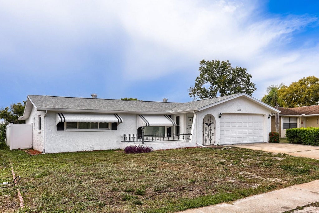 Photo of 7230 Bimini Drive, Port Richey, FL 34668 (MLS # TB8552932)