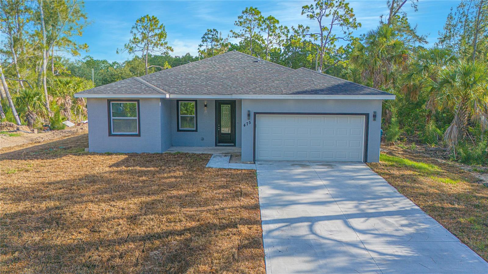 Brand New Single-Story Home in an Oversized Lot and NO HOA! Move-in Ready with numerous Upgrades, this gorgeous home offers 4 bedrooms and 2 bathrooms, complete with stylish vinyl flooring (no carpet!), a stunning dream kitchen with quartz countertops, stainless steel appliances, a large island, perfect for entertaining, recessed lighting, and ample storage. The spacious primary bedroom features a luxurious
ensuite bath with double vanities, a walk-in shower with glass doors, and sleek tile finishes. Enjoy a generous backyard perfect for relaxing with nature views or hosting BBQs. Conveniently located in SW Palm Bay, just minutes from Fred Poppe Regional Park, Bayside Lakes shops and dining, Turkey Creek Sanctuary and with easy access to I-95 and the St. Johns Heritage Parkway. And for those beach days, Melbourne Beach is only about 4.8 miles away! Schedule your showing today!