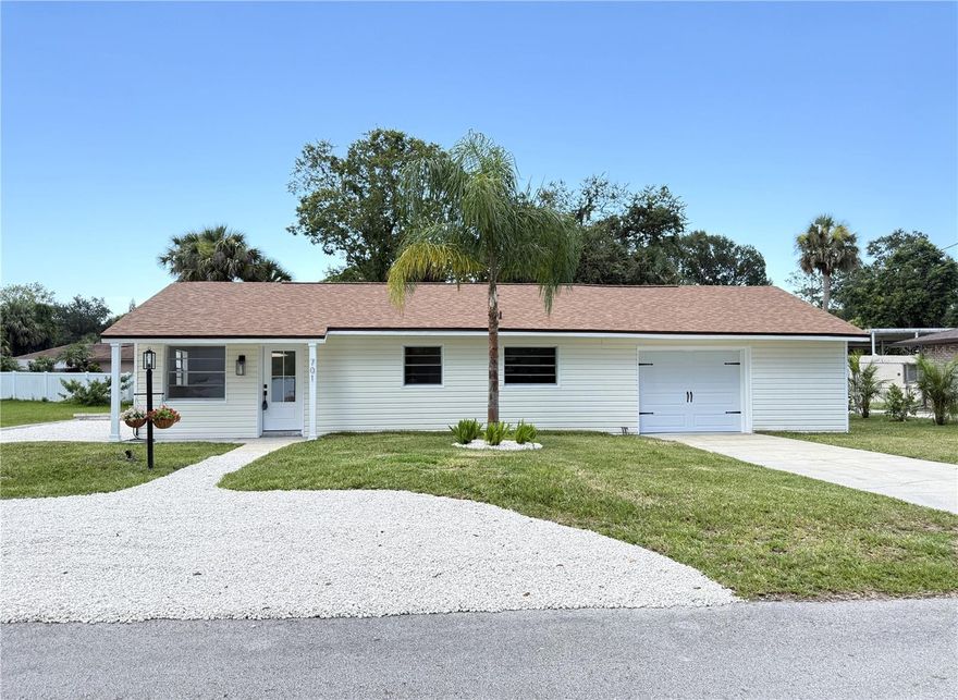 Renovated Yr 2025 3-bedroom, 1-bath home with a large garage on .29 acres. Beautiful modern yr 2025 kitchen with white soft close cabinets, quartz countertops, and stainless steel appliances, including a dishwasher, side-by-side refrigerator, range oven, and built-in microwave. Built-in trash can drawer. The deep kitchen sink with a gooseneck faucet overlooks the pleasant landscaped front yard. Designer tile adorns the backsplash. In the bathroom, a modern light is built into the mirror above a raised sink, with a window for ventilation. All bedrooms feature louvered closet doors, and the center bedroom has exterior access door to the backyard. This is in a quiet neighborhood with a short drive to shopping and restaurants.