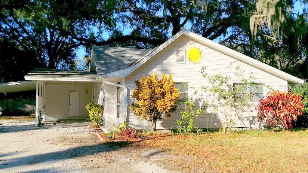 BEAUTIFUL 4 BEDROOM 2 BATHROOM HOME LOCATED MINUTES FROM RINGLING COLLEGE, NEW COLLEGE, VAN WEZEL PROFORMING ARTS HALL, AND SARASOTA BAY! This home has all of the space that you and your family need. When you walk in you will love how the updated flooring, open floor plan and large windows giving this home a nice, bright and clean feel. The kitchen features plenty of cabinet and counter space along with updated appliances. The dining room opens up to your living space and is the perfect place to sit back and spend some time with your family and friends. This home comes with 4 nice size bedrooms. The primary bedroom features its own private bathroom that is completely updated and features a walk-in shower. The second bathroom is also fully updated and features a tub/shower combo. This home offers two covered car ports and has plenty of room to park your camper or boat. All of this is located near public transportation, tons of restaurants and shopping and Ringling School of Art and Design, Sarasota Bradenton Airport and Sarasota Bay. Call for your private showing today!