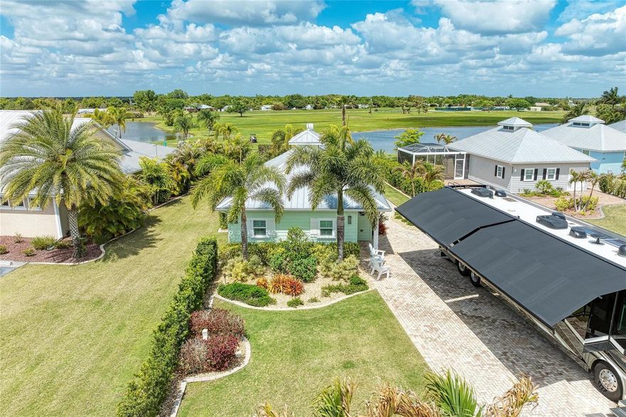 This beautiful fully furnished / turnkey cozy Coach House on Lot 86 at Thornton Creek Motorcoach Resort offers the perfect space for everyday living or entertaining guests. With 1,000 square feet under roof seamlessly connected to a 375-square-foot screened lanai, the home feels bright, spacious, and airy—allowing for natural flow between the fully equipped kitchen and comfortable living area.  It also features a dedicated bar area, a versatile room that can be used as a bedroom, office, or guest suite, and a spacious full bathroom. The large laundry area connects directly to the golf cart garage, adding extra convenience. Outdoors, you’ll find a charming fire pit area—ideal for enjoying the stunning Gulf Coast sunsets.  This property is located just a short walk from the clubhouse, where you can take advantage of the resort’s amenities and social activities. Come visit and tour this beautiful home and experience the exceptional lifestyle of this one-of-a-kind resort, located right across from the golf course. Schedule your private showing today!