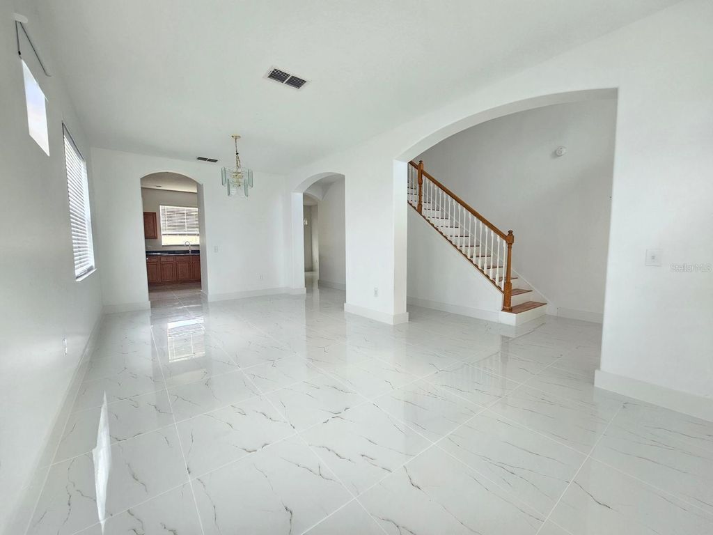 Photo of 2718 Lucas Lakes Lane, Kissimmee, FL 34744 (MLS # O6374248)