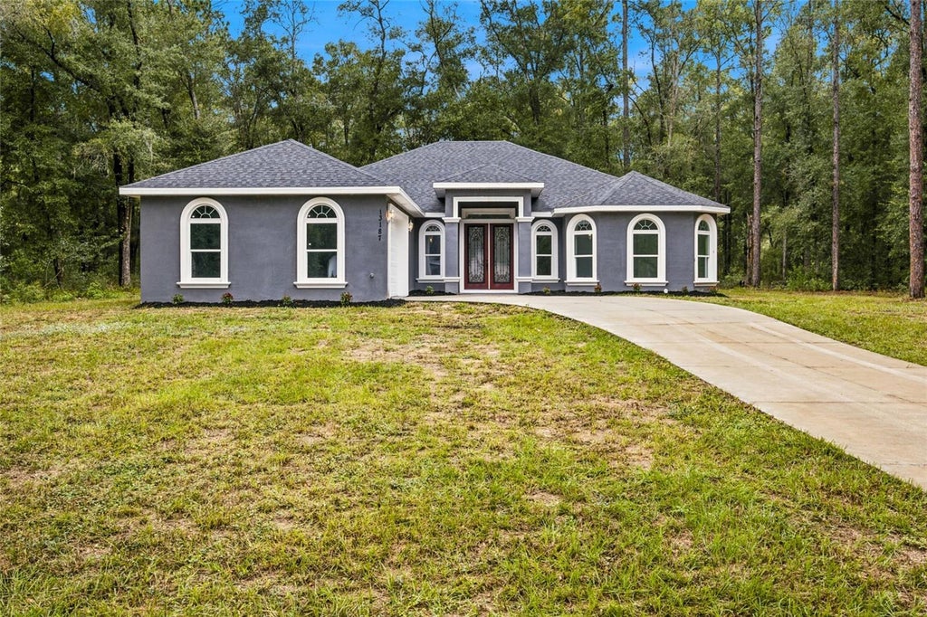 Photo of 13187 SW 52 Lane Road, Ocala, FL 34481 (MLS # OM734149)
