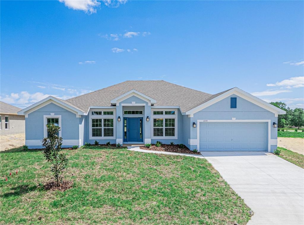 Photo of 1230 Hickory Nut Drive, Lake Wales, FL 33898 (MLS # L4957878)