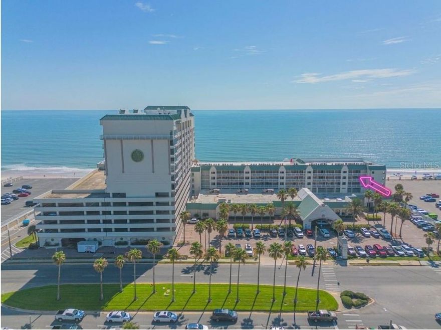 This remodeled and fully furnished oceanfront condo studio, spanning 308 sq ft, offers stunning westerly views and excellent income potential. Currently enrolled in a rental program, this unit generates transferable passive income while allowing you the flexibility for personal use at your convenience. The studio features a king bed, new flooring, and a sitting area with a queen sleeper sofa, along with a kitchenette for light meals and an updated bathroom. Guests will appreciate the prime beachfront location, ideal for activities such as paddleboarding, surfing, and relaxing on the sand. Situated just half a mile from Andy Romano Beachfront Park, you'll have easy access to picnic areas, a splash pad, and family-friendly fun. This property is consistently in demand, thanks to its proximity to dining, shopping, and entertainment options. Resort amenities will reopen following renovations. Invest in oceanfront living--your opportunity awaits!

The Daytona Beach Resort features an outdoor heated pool, an indoor pool with two hot tubs, a sauna, a gym, and meeting space.

UPGRADES:
New quartz counters
New appliances
All new appliances
New light fixtures
Fresh paint.
Renovated bathroom.

(Note: Additional common area features include a second outdoor pool, a playful splash pad, a fire pit, a tiki bar, a restaurant, and resort function rooms. These amenities are currently under repair and renovation.)