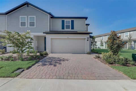 Photo of 501 Legacy Loop, Davenport, FL 33896 (MLS # O6441963)