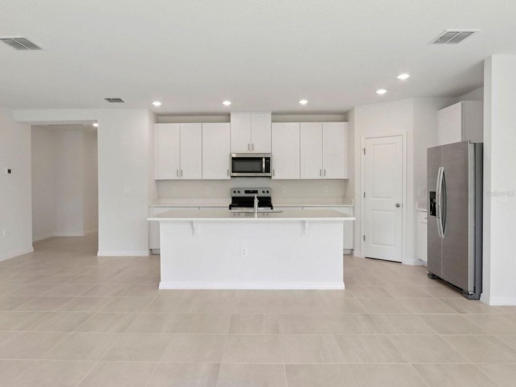 Photo of 1647 Bark Ridge Drive, Auburndale, FL 33823 (MLS # O6351923)