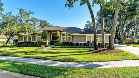 Photo of 6590 Crescent Lake Drive, Lakeland, FL 33813 (MLS # L4963321)
