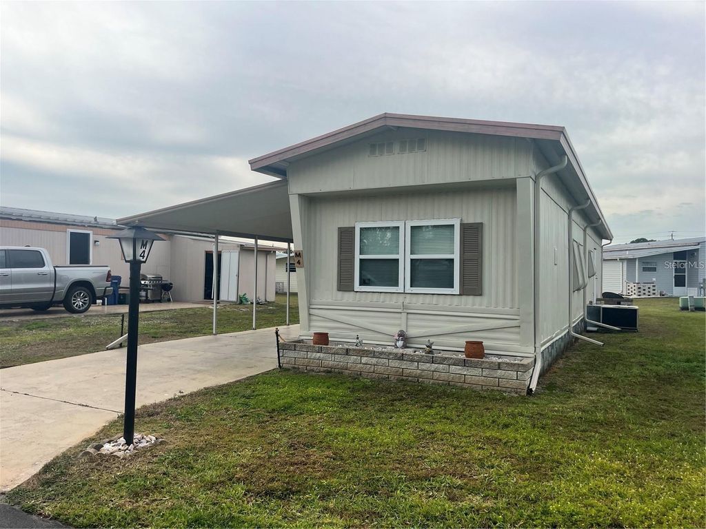 Photo of 5316 53rd Avenue E #M4, Bradenton, FL 34203 (MLS # A4676491)