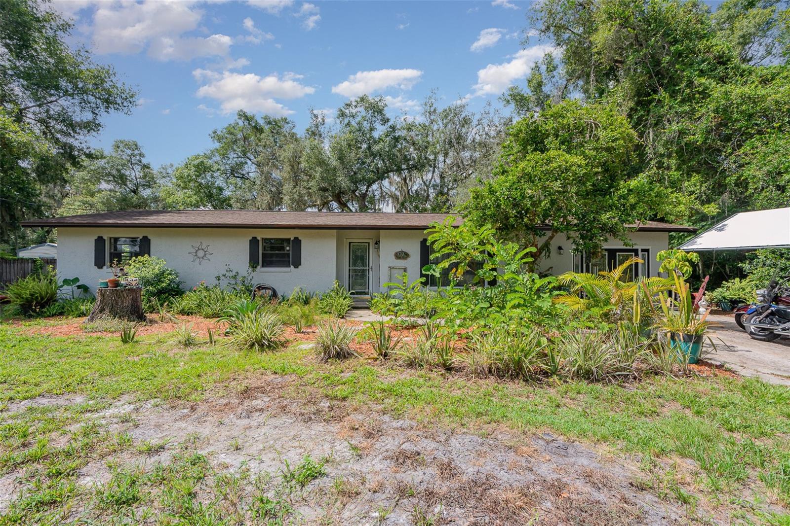 Charming 4-Bedroom Home on Spacious Lot – Prime Location!
Discover the wonderful blend of comfort and convenience in this well-maintained 4-bedroom, 3-bathroom home situated on a generous lot with oaks and other native plants. Ideal for families or anyone who enjoys space and privacy. This property features a screened-in room, perfect for relaxing or entertaining year-round.
The detached work shed offers plenty of space for hobbies, projects, or extra storage, and the fully fenced yard makes it ideal for pets, gardening, or outdoor play.
Located just minutes from shopping, dining, and entertainment, this home is conveniently positioned between Sanford and Daytona Beach, offering easy access to major roadways. Whether you're commuting or exploring local attractions, you’ll love this centrally located gem.
Don’t miss your chance to own a slice of Florida living with room to grow and enjoy.