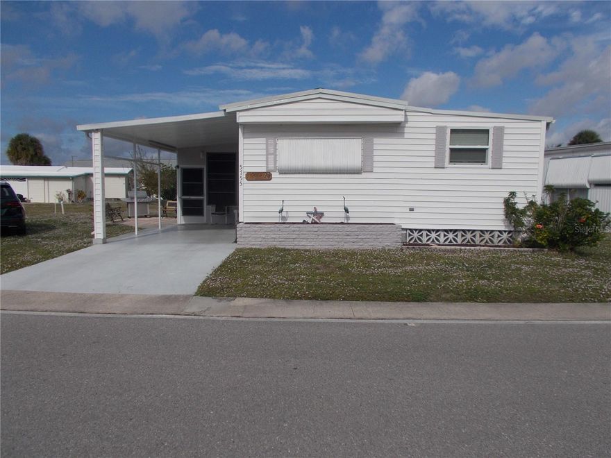 Welcome to 5755 Holiday Park Blvd., which is a 2 Bedroom, 2 Bath furnished home located in the PET SECTION.  This home has it all.  A beautiful eat-in Kitchen with laminate flooring and a Large Living Room with the same flooring.  Off the Kitchen you have a bump out which has your Bonus Room. To the right you will enter the Master Bedroom and Master Bathroom with shower.  Down the hall from the Living Room, you have Bedroom #2 and the 2nd Bathroom.  You have a large Lanai which leads into your Laundry/Workshop.  You also have a shed for your extra things.  This home has a new metal roof that was installed (as per the owner) in 2023 and except for the living room and kitchen ceiling the house has 1/2 inch drywall . Owner has had a 4-point inspection done on the home. In Holiday Park you own the land with a deed and your monthly maintenance charge of $195.00 ($2340.00 a year) is included in your taxes. The community features 2 clubhouses, 2 swimming pools, a library, fitness center, tennis courts, pickle ball & bocce to name a few. You are close to shopping, dining, entertainment,numerous golf courses, sports facilities, airports and SW Florida's world renowned beaches.  Come take a look!
