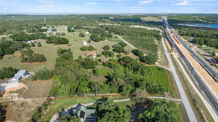 Discover the perfect blend of country and the vibrant Florida lifestyle with this 4.4 acre high and dry agricultural parcel in the desirable Clermont area. This property is ideal for farming, equestrian activities, or building your dream home in a serene, rural setting - without sacrificing modern convenience or outdoor adventure.  There’s room to grow and plenty of space for barns, storage, gardens, and outdoor play areas, Minutes from historic downtown Clermont, Waterfront Park and Lake Louisa State Park where you can enjoy family friendly events, local dining, lakeside charm, and outdoor activities. Convenient access to Hwy. 27 , Florida's Turnpike, plus an easy commute to Orlando's attractions, top rated schools, and destinations like Disney and Legoland. You're just over an hour to the gulf beaches on the West, and the Atlantic surf on the east - ideal for spontaneous beach days, fishing trips, and coastal getaways. Whether you're starting a homestead, raising a family, or simply craving more space and sunshine, this property offers the freedom, flexibility, and lifestyle you've been dreaming of. Don't miss out on this rare opportunity to own usable land in a sunny Central Florida.