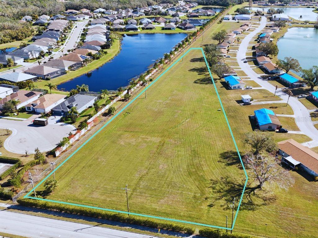 Prime Vacant Lot in the Heart of Bradenton. This expansive 2.07+ acre vacant lot is perfectly positioned just off of State Road 64 and 117th Street East.
The lot boasts an ideal location, providing easy access to major roads, interstates and Lakewood Ranch, which makes it a convenient site for both residential and commercial projects. It is currently zoned PD-R (Planned Development-Residential), offering flexibility for various uses and developments. With water, sewer, and electric services nearby, the lot is ready for your plans to come to life. Additionally, the property has been fully cleared, saving you time and effort in preparing the land for construction.
This lot presents endless opportunities for development, whether you're envisioning a residential community, a multi-family complex, or a unique custom estate. The spaciousness of the property allows for creative and expansive project designs.
Don't miss your chance to own this prime piece of real estate in one of Florida's most sought-after locations. Whether you're an investor or a future homeowner dreaming of building a tailored space, this lot offers a rare opportunity to create something truly special. Schedule a visit today and explore the possibilities that await on this remarkable property.