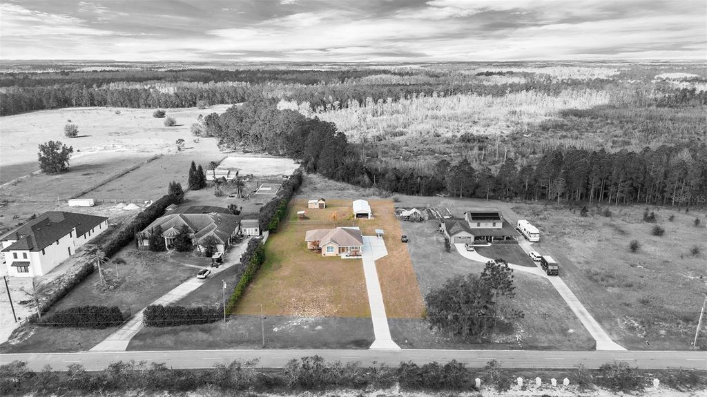 Photo of 12647 Sweet Hill Road, Polk City, FL 33868 (MLS # P4938060)