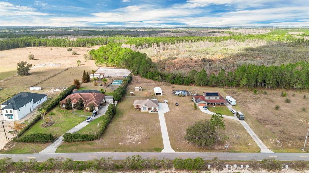 Photo of 12647 Sweet Hill Road, Polk City, FL 33868 (MLS # P4938060)