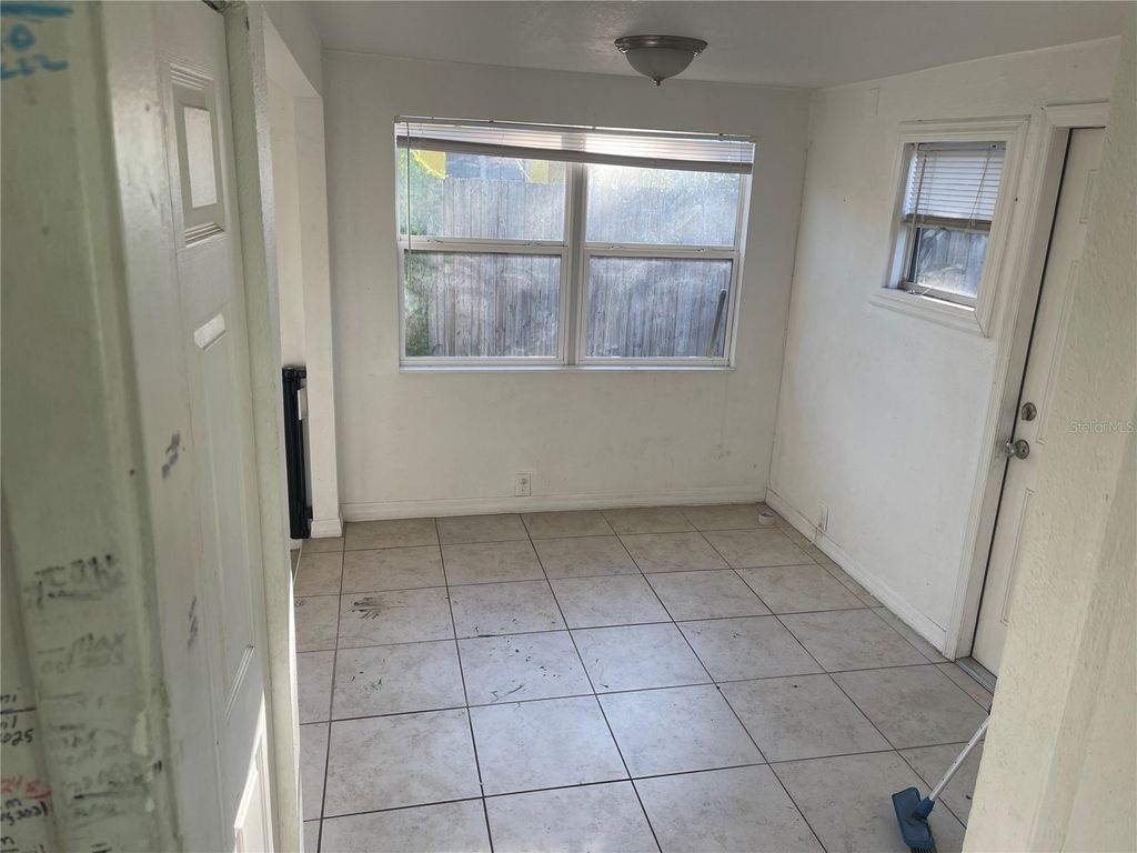 Photo of 3608 W Wallace Avenue, Tampa, FL 33611 (MLS # TB8442482)