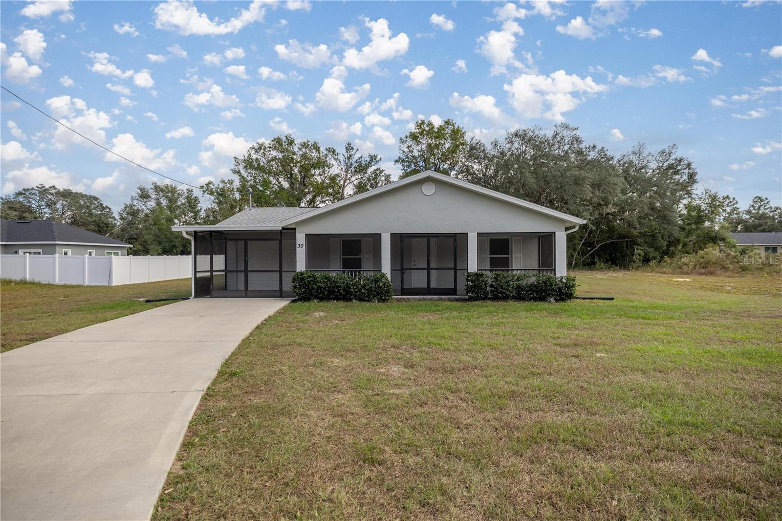MOVE IN SPECIAL! HALF OFF FIRST MONTH RENT! NO HOA! NOT IN A FLOOD ZONE! SCREENED IN FRONT PORCH! This beautiful open floor plan home offers 3 bedrooms, 2 bathrooms, and a 1-car garage, all situated on a spacious lot. The well-appointed eat-in kitchen features GRANITE countertops, a large kitchen island with a deep-set sink and triple osmosis system, upgraded cabinets with crown molding, recessed lighting, and stainless-steel appliances, including a newer fridge. The kitchen also boasts a pantry and ample space for dining, seamlessly opening into the expansive living room with beautiful LVP flooring throughout. The spacious primary suite includes a walk-in closet and an ensuite with double vanity sinks and a walk-in shower. The generously sized guest bedrooms offer large closets for plenty of storage. Outside, the home is equally impressive, featuring a screened-in front porch perfect for enjoying summer evenings, a large backyard ideal for BBQs and outdoor activities. The home is also equipped with a water softener system, adding convenience and comfort. This home blends style, functionality, and outdoor living for the ultimate family retreat. Don't miss out on this home, make your appointment today! Shed can also be rented. Home also listed for sale.