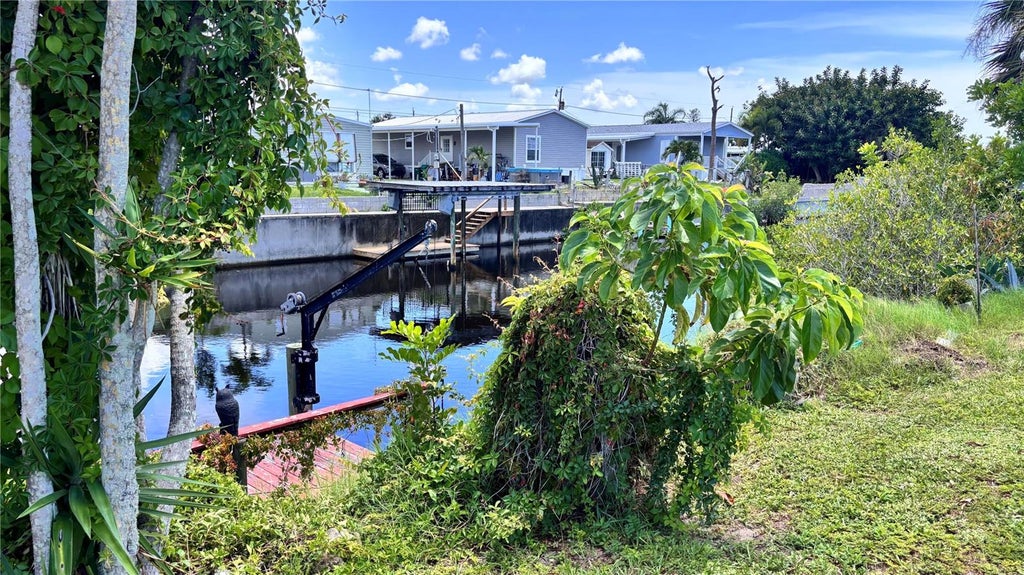 Photo of 1305 Kingfisher Drive, Englewood, FL 34224 (MLS # C7530082)