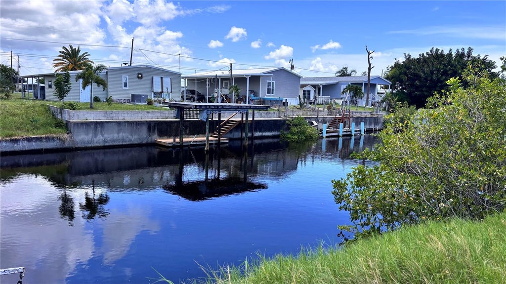 Photo of 1305 Kingfisher Drive, Englewood, FL 34224 (MLS # C7530082)