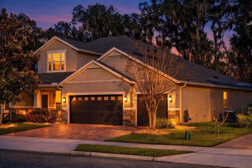 Welcome to 648 Fanning Drive in Winter Springs, a beautifully maintained and thoughtfully upgraded 5 bedroom, 4 bathroom home offering 3,718 square feet of living space with a highly functional layout designed for today’s lifestyle. Built in 2012 and ideal for multi generational living, this home features a desirable triple split floor plan that allows owners, family members, and guests to each enjoy their own private living areas. A 3 car garage, private home office with double doors, and a spacious bonus room provide exceptional flexibility for work, play, and extended family needs.

Recent major updates provide peace of mind, including a brand new roof (2025), a new HVAC system with dehumidifier (2024), a new microwave (2025), and a new dryer (2023). Interior finishes include wood look tile in the primary bedroom, luxury plank vinyl flooring in three guest bedrooms and office, and custom luxury closet built ins in the primary suite and bedrooms two and three. Ceiling fans are installed in all bedrooms, and the home is prewired for surround sound in the family room, bonus room, and rear patio, with speakers already in place in the family room.

The open island kitchen serves as the heart of the home and features 42 inch espresso cabinets, granite countertops, a tumbled marble backsplash, stainless steel appliances including refrigerator, microwave, dishwasher, and range.  Additionally under cabinet lighting, a walk in pantry, and a butler pantry with additional storage, making the kitchen ideal for both entertaining and daily living. The laundry room includes a utility sink and convenient drop zone, with washer and dryer included.

One of the most loved aspects of this home is the lifestyle it offers. Enjoy tranquil pond views from the front porch and lush tree lined privacy from the screened rear patio, creating a peaceful and scenic setting both morning and evening. Living next to the Seminole Trail is a true highlight, offering easy access for walking, biking, and connecting with friendly neighbors. The neighborhood is peaceful, welcoming, and beautifully maintained. The community pool is just a short walk away and is well maintained, offering a perfect spot to relax and enjoy Florida living.

Convenience is unmatched with everyday essentials located approximately one mile away, including Publix, Crunch Fitness, Starbucks, UPS Store, Foxtail Coffee, Jersey Mike’s, and Huey Magoo’s, with Chick fil A and Wawa coming soon.

Additional exterior and features include a pavers on the driveway and screened rear patio, gutters, double pane tinted windows, a security system, termite bond, and in wall pest control system. Low HOA dues include access to the community pool and common areas.

This move in ready home delivers space, privacy, thoughtful upgrades, scenic views, and an exceptional location in one of Winter Springs’ most desirable communities. Hurry, come see!