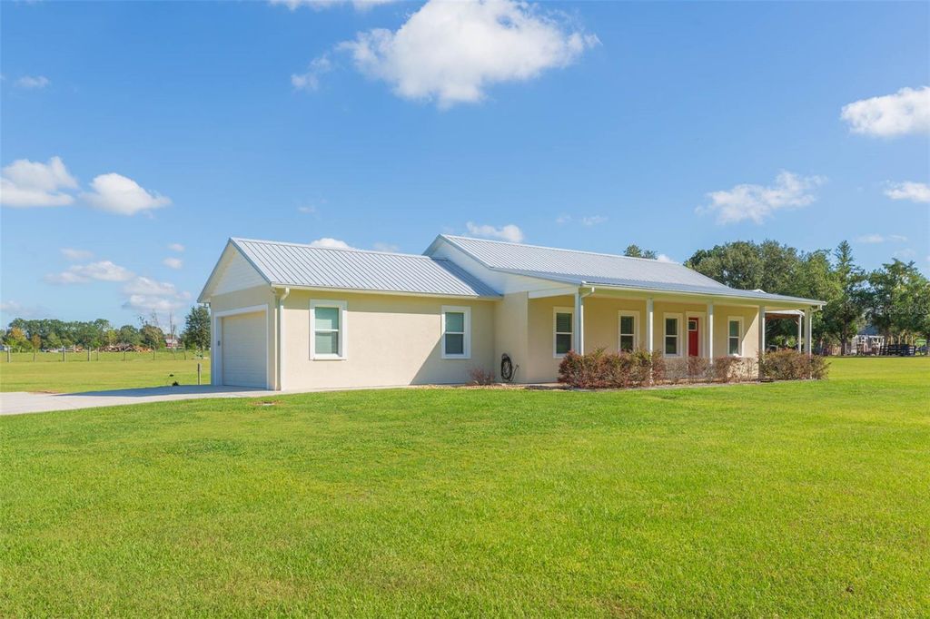 Photo of 36315 Florrie Mae Lane, Dade City, FL 33523 (MLS # TB8439089)