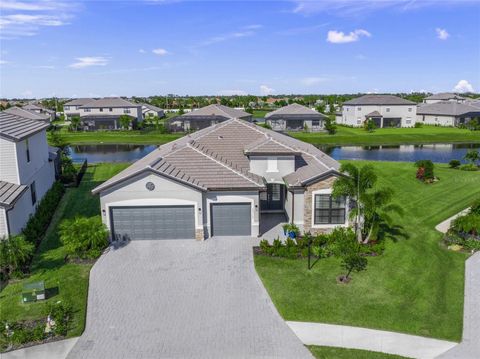 Photo of 15117 Blue Bay Terrace, Bradenton, FL 34211 (MLS # A4670226)