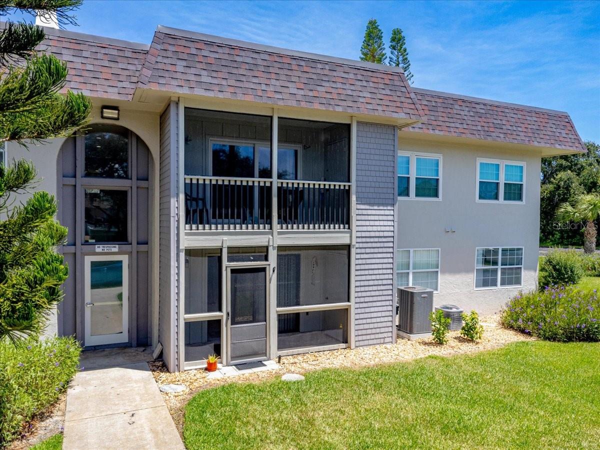 One or more photo(s) has been virtually staged. Coastal Living at Its Finest – New Smyrna Beach. One of the Best Values for Your Money on the Island!
This beautifully maintained condo community is just a short distance from the shoreline and
adjacent to the tranquil Indian River Lagoon Park. This 2-bedroom, 1.5-bath ground-floor condo
offers the perfect combination of comfort, convenience, and coastal charm.
The stylish kitchen showcases white cabinets with new handles, stainless steel appliances, and a
brand-new stainless steel large sink with integrated cutting board and drying rack features. The
open living and dining area flows seamlessly to a screened-in rear porch with an extra storage
closet—perfect for relaxing after a day in the sun.
Recent upgrades include a 2024 AC, 2024 water heater, and a 2023 roof, providing peace of
mind for years to come. Additional enhancements include a new stainless steel sink and faucet,
plus both bathrooms upgraded with modern “seat-height” toilets—one completed in 2025.
This low-density, two-story community offers a laid-back atmosphere and a beautifully
manicured courtyard. Amenities include a sparkling community pool, BBQ and picnic area,
kayak and bicycle storage, laundry facilities, and direct access to Indian River Lagoon Park—
ideal for fishing, paddleboarding, or kayaking right from your backyard.
Cable, internet, exterior pest control, and exterior maintenance are all included for easy living.
Centrally located in New Smyrna Beachside, you’re less than five minutes from Flagler
Avenue’s shops, dining, and nightlife, and just a short drive to the historic charm of Canal Street.
Whether you’re looking for a weekend getaway or a full-time coastal residence, this condo offers the ultimate Florida lifestyle.