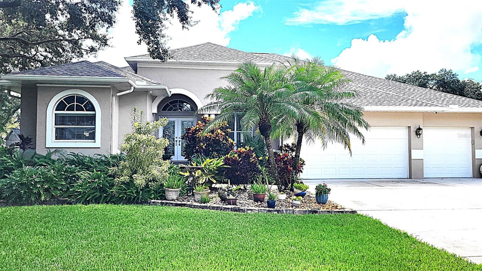 Built in 2002, this beautiful home was thoughtfully maintained and newly renovated between 2020-2025. It is located in the Meadowbrook Estates (FL 54 and SR 589) on 1.01 acre corner lot in a quiet mature neighborhood with fully fenced yard and professionally landscaped. In-ground heated pool and spa tub. Owned solar system and well/septic make this property easy on utility bills. And, no HOA or CDD.
Some highlights of this home are as follows:
New roof, lanai pool screen and cables, and gutter guards in 2025.
Solar panel system (owned), installed ~2023.
Spacious 4 bedroom, 3 bathroom home with 10 ft ceilings and upgraded crown and baseboards.
New custom knotty cherry wood kitchen with KitchenAid stainless steel appliances and upscale granite (2021).
Master bedroom has hardwood flooring (2023), three additional bedrooms are carpeted (2021), ceramic tile in all other areas of the house.
In-ground (owned) 250 gallon propane tank runs gas range, Renai tankless hot water heater, clothes dryer and pool heater.
Detached custom 12x20 tall workshop (with upgrades) and loft storage (2023).
Complete hurricane shutter system. Hook-up for portable generator added in 2024.
Professionally installed security system (2021) with hard wired window/doors and glass break. Driveway gate with a mag lock added for security, controllable via app on phone. Separate alarm system hardwired for doors and windows leading to pool area.
New septic system leach field and upgraded service for septic system (2023).
Zoned agricultural/residential (AR1)...horses welcome.
Full irrigation system with 9 zones controllable via app on phone.
Ask about the possibility of a private "mini suite" within the home.
And, so much more! Call for your private tour. Offered for $974,999