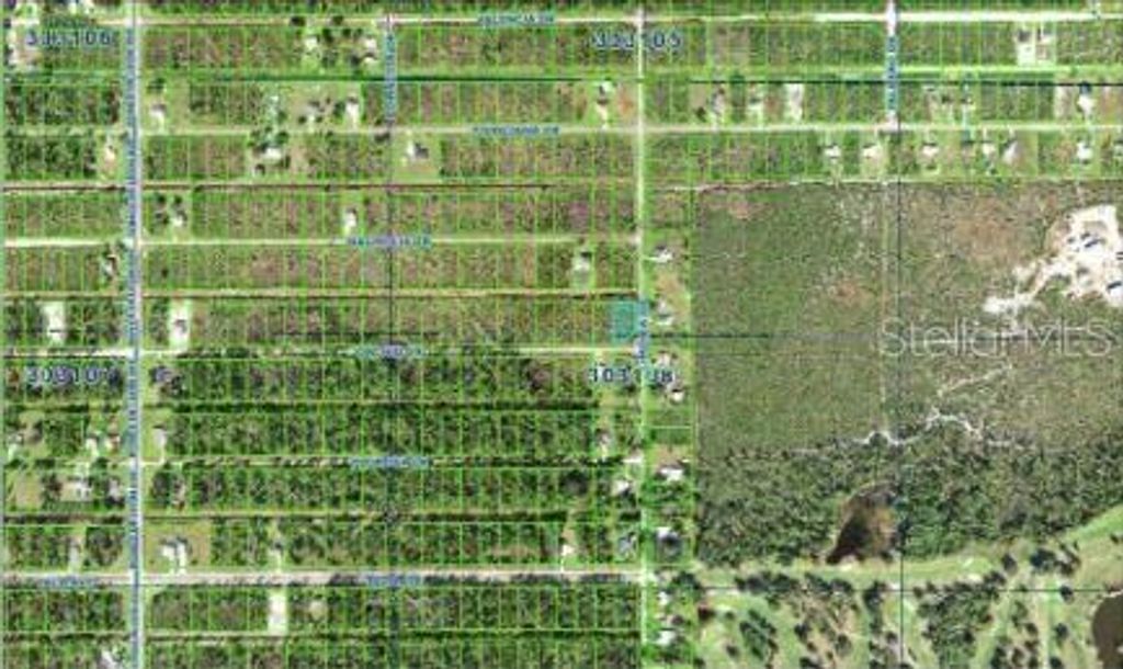 Photo of 202 Orchid Drive, Indian Lake Estates, FL 33855 (MLS # O6312419)