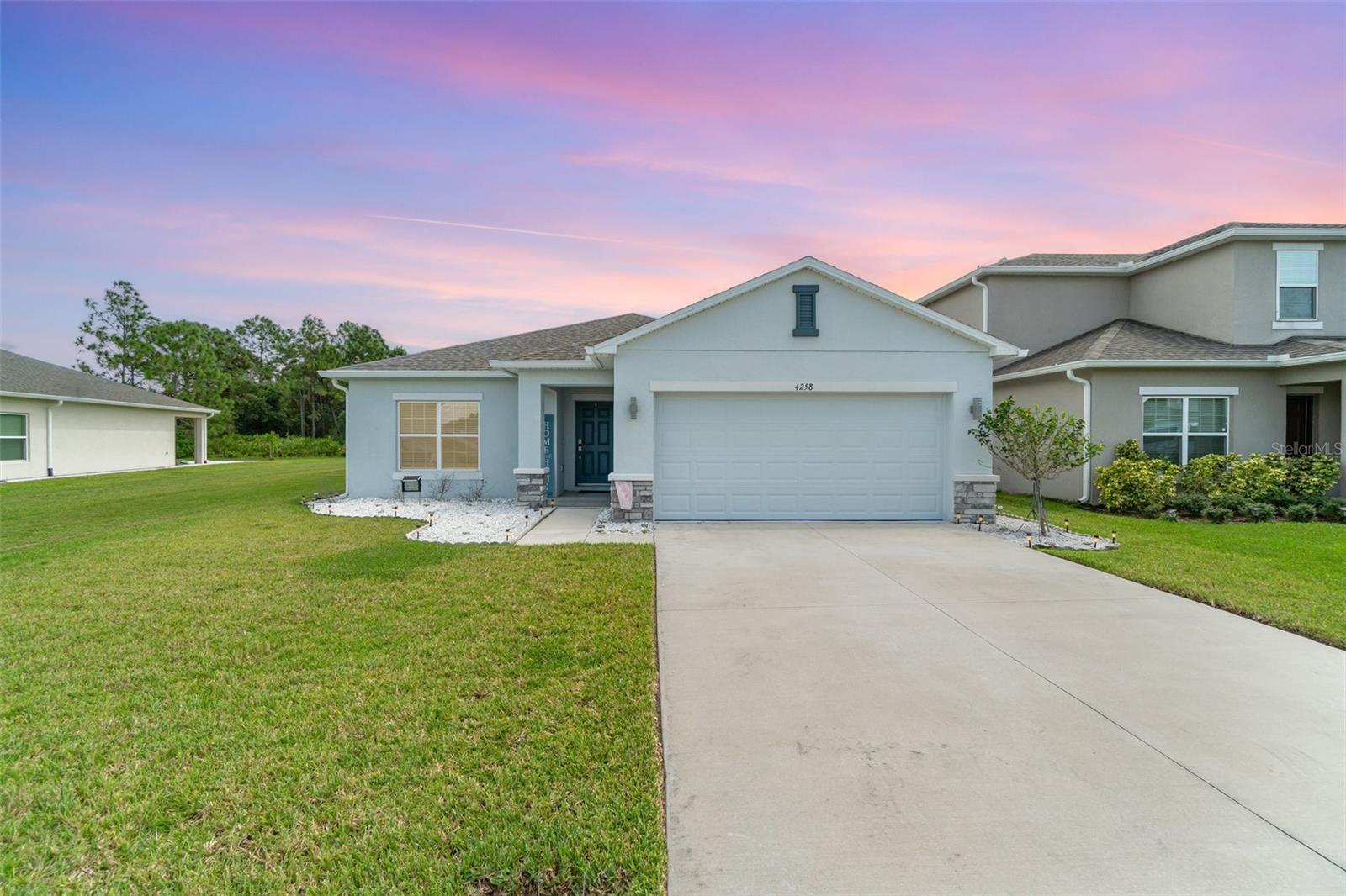 Few things are better than brand new and this home is the essence of just that. Its brand new AND has all the add-ons you can only dream of! All carpet has been removed throughout the home allowing for clean lines and less dust, the landscaping has been perfectly modified for easy maintenance, the walls have not seen a single nail, the rear porch enclosure is one you've never seen before as it spans the entire width of the house is wired for fans, completely paved and has a private direct water view with peace and serenity. The lot is one of the few a very large space separating the two homes on the left that can never be built on and a lot that faces only the conservation and a pond as your rear neighbor.
This home is a thing of beauty as the pure white walls and light floors bring light from every which direction throughout the house. The primary room is exactly what you expect from a true primary; direct views from the pond, a great size space, huge walk-in closet and a wonderful en-suite with dual sinks. The guest bedrooms are a great size and have wonderful privacy from any neighbors. The Kitchen, living and dining room have a beautiful inviting open floor plan that allow for entertaining. If you love the furnishings then you'll be happy to know that the seller is open to letting go of furnishings as an add-on option. Whether you love to live in peace, have a water view from either the front or rear of home and not have to worry about any updates whatsoever; then the word turnkey is spelled 4258 Southern Vista Loop for you. I'll see you soon!