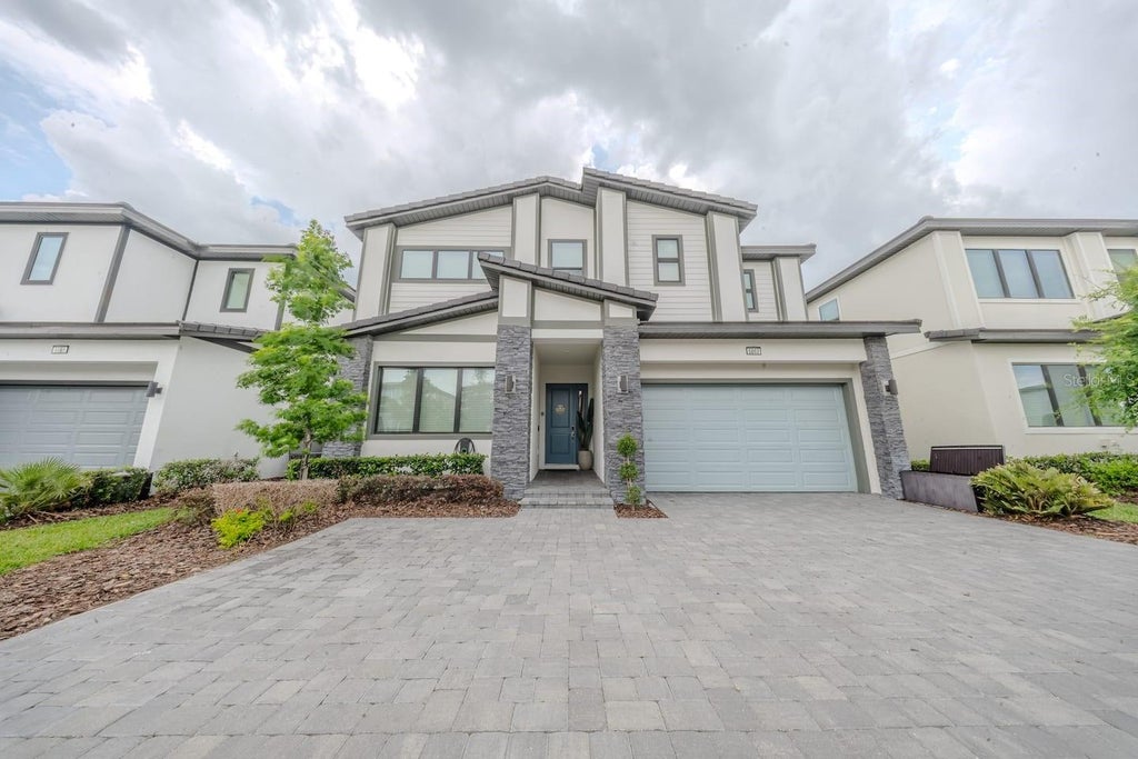 Photo of 5863 High Seas Drive, Orlando, FL 32821 (MLS # O6439979)