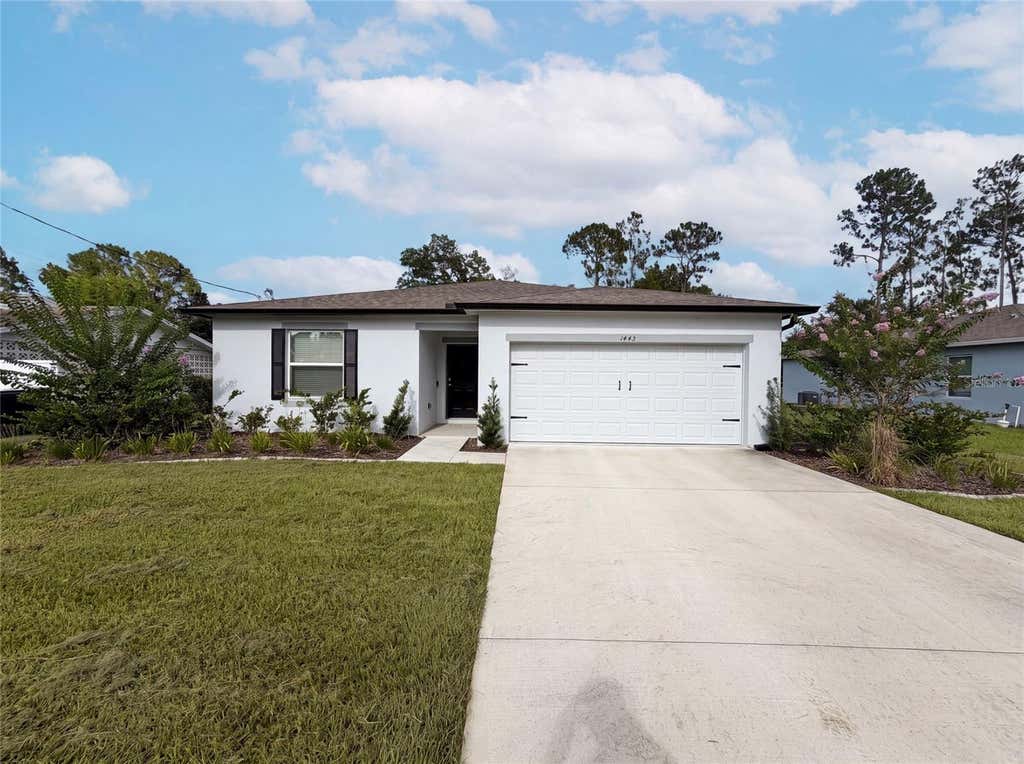 Photo of 1443 General Custer Avenue, Daytona Beach, FL 32124 (MLS # O6423658)