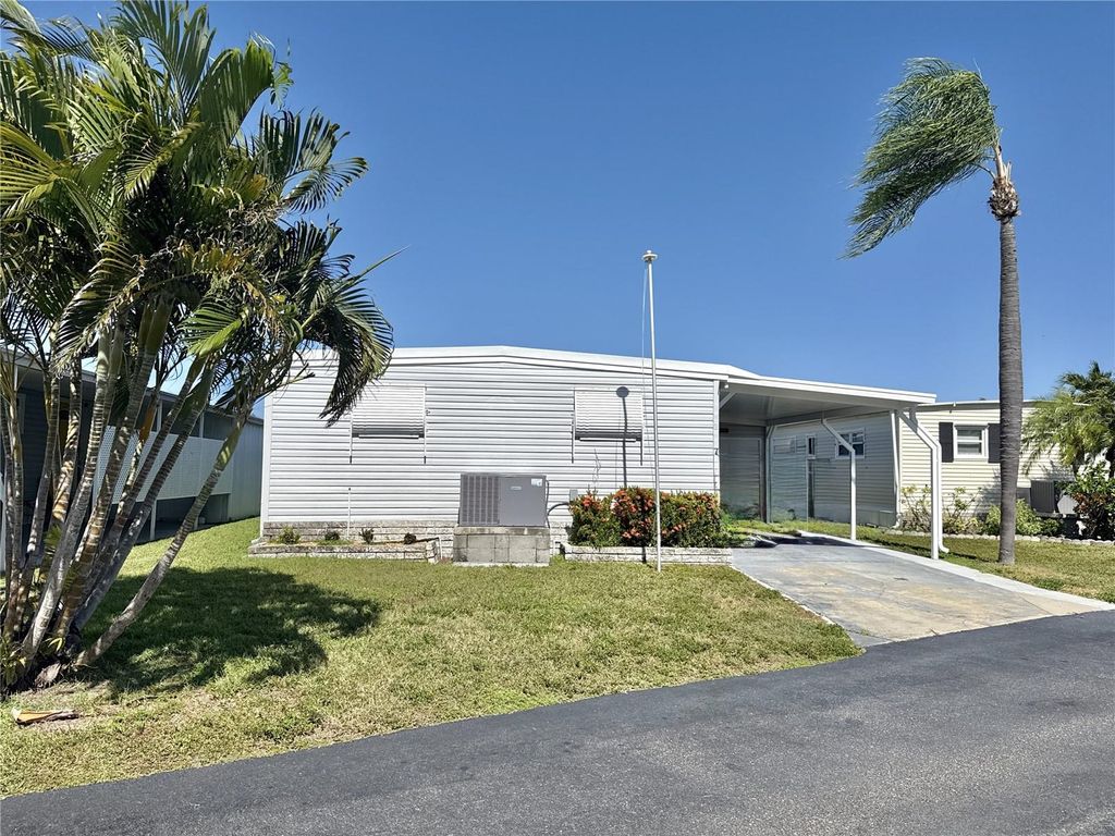 Photo of 7186 Mount Arlington Drive NE #421, St Petersburg, FL 33702 (MLS # TB8441854)