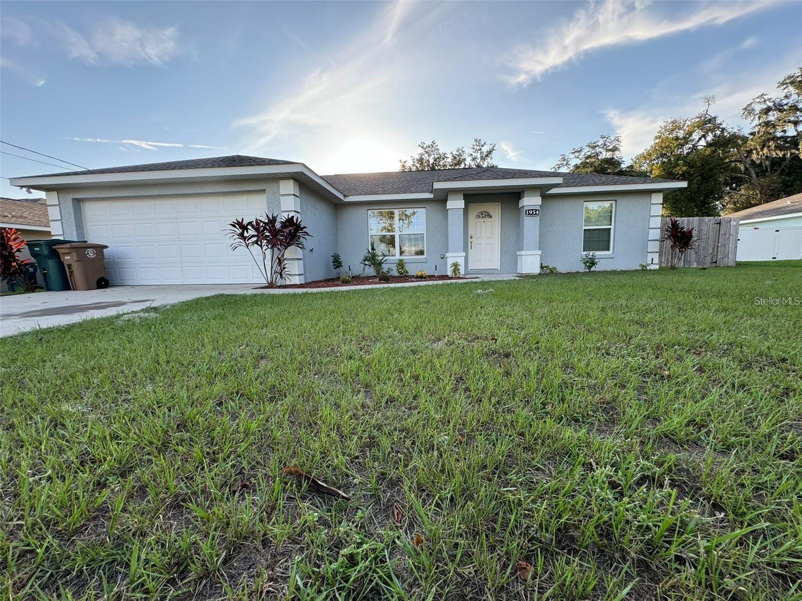 This magnificent property welcomes you into a light & bright living room with an open concept area, perfect for entertaining! It features a master suite with a spacious walk in closet and ensuite. There are 2 additional guest bedrooms with a guest bath that features a tub/shower. The Kitchen over looks the Living & Dining Area with Stainless Steel appliances, breakfast bar, lots of counter space & wood cabinets. The Fenced in spacious yard allows privacy & great for family gatherings. Conveniently located near Lillian Bryant Park which features a basketball court, playground, Fitness Trail & splash pad. Downtown Ocala is only 8 minutes which features shopping, restaurants & seasonal festivals & markets.