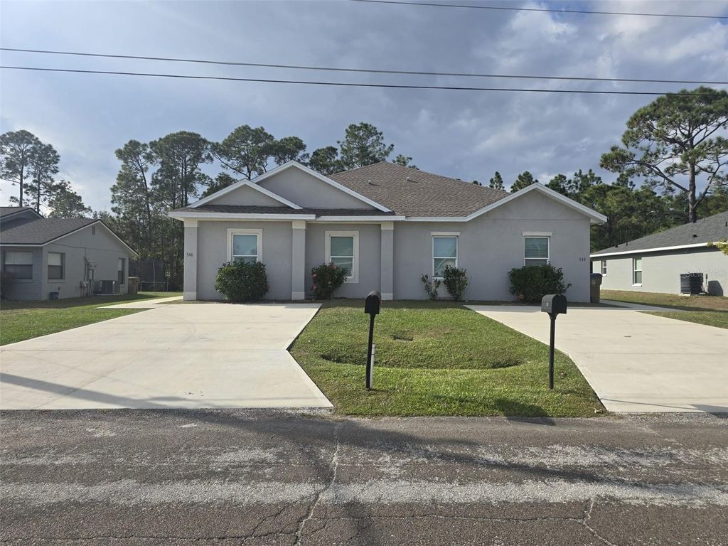 Photo of 546 Imperial Pl, Kissimmee, FL 34758 (MLS # O6389245)