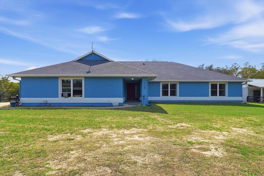 Luxury Farm Living with Modern Upgrades – No HOA! Welcome to this beautifully upgraded private farm retreat tucked away at the end of a cul-de-sac in Dunnellon. Designed for both comfort and functionality, this property offers the perfect blend of modern technology, energy efficiency, and equestrian amenities on fully fenced acreage with open pastures and majestic shade oaks. The home features cathedral ceilings, new windows throughout (2018), updated A/C (2021), and a new roof (2021) for peace of mind. Stay connected with Spectrum fiber optic internet, Spectrum TV service, Starlink installation, and a cell phone/WiFi booster. Additional upgrades include solar panels (2025), wired generator plug-in, ADT security system, fire and smoke detectors, and a Whirlpool water softener system (2018). Enjoy year-round Florida living in the huge Florida Room with mini-split (2024) overlooking the stunning heated saltwater pool and spa with waterfall and screened enclosure installed in 2023—perfect for entertaining or relaxing in privacy. Equestrian enthusiasts will love the concrete block stucco 3-stall barn with room for additional stalls, wash/grooming rack, and office or tack room. The property is completely fenced with 10 paddocks, open pastures, and large shade oaks, creating an ideal setup for horses or livestock. Additional features include two storage sheds, several awnings, remote gate entry system, and ample space for equipment. With ceiling fans, light fixtures, and window blinds all conveying, this property is move-in ready and thoughtfully designed for country living with modern convenience. No HOA — bring your horses, toys, and enjoy the freedom of farm life just minutes from medical, shopping, dining, The World Equestrian Center and the beautiful Rainbow Springs State Park! Schedule your showing today! Buyer and buyer's agent to verify all information.