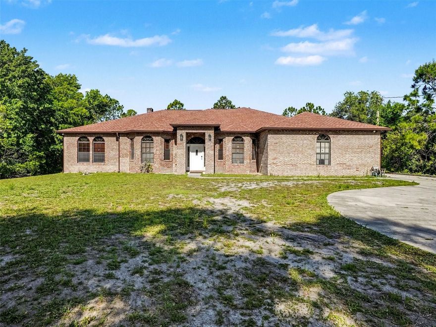 1.74 ACRES. NO HOA. BRICK CONSTRUCTION. SPACE + FUNCTION IN ORLANDO.

Welcome to 3612 Bancroft Blvd — a rare opportunity to own nearly 1.75 acres in Orlando with the kind of privacy, space, and flexibility buyers are constantly searching for.

From the moment you arrive, you feel the difference — wide open land, mature surroundings, and no HOA restrictions. Bring the boats, RVs, trailers — or simply enjoy the freedom and space that’s getting harder to find.

Built with solid brick construction, this home offers durability and long-term value, paired with two A/C units for efficient comfort and a whole-home water filtration system already in place.

Inside, the layout is designed for both everyday living and privacy. The primary suite is positioned on its own side of the home, complete with a private fireplace for a true retreat feel, while two additional bedrooms and a full bathroom are located on the opposite side — ideal for guests, family, or multi-generational living.

The heart of the home is the spacious family room and kitchen combination, where the fireplace serves as a stunning focal point, creating a warm, inviting space perfect for gathering and entertaining.

The kitchen features wood cabinetry, a functional center island for prep space, and upgraded stainless steel appliances, giving you both style and practicality without sacrificing flow.

You’ll also find formal living and dining rooms, offering flexibility for hosting or additional living space.

An indoor laundry room adds convenience, and the 3-car garage provides plenty of room for vehicles, storage, or a workshop setup.

This isn’t just a home — it’s land, privacy, and a layout that truly works.

Acreage. No HOA. Split floor plan. Statement living space. Upgraded kitchen.