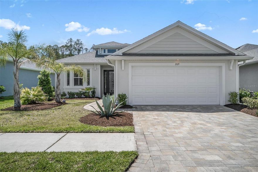 Welcome to this beautifully built 2024 home in the desirable Coastal Gardens community of Palm Coast. Offering 3 bedrooms plus a versatile den/office and 2 full baths, this move-in-ready residence combines modern construction with thoughtful upgrades and timeless style.
Step inside to find elegant tile flooring and an open, light-filled layout enhanced by skylights that bring in abundant natural light. Gorgeous plantation shutters add both charm and privacy, while the spacious eat-in kitchen is designed for everyday living and entertaining. Enjoy a stylish backsplash, all appliances included, and a recently updated pantry featuring convenient roll-out shelving for maximum organization. All cabinets have pull out shelving. The two guest rooms have California closets. The living space flows seamlessly to an oversized, tiled, covered, and screened back porch—perfect for relaxing or hosting guests while overlooking a scenic pond view. Built with quality craftsmanship and meticulously maintained, this home is truly turn-key—clean, fresh, and ready for its new owners. Additional highlights include a low HOA fee and a central location close to shopping, dining, schools, and everything Palm Coast has to offer. All that’s left to do is move in and enjoy Florida living at its finest.