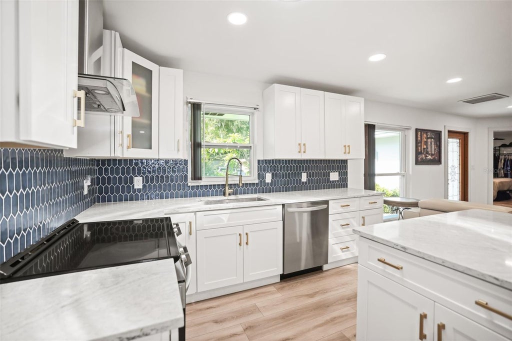 Photo of 1981 Castille Drive, Dunedin, FL 34698 (MLS # TB8532619)