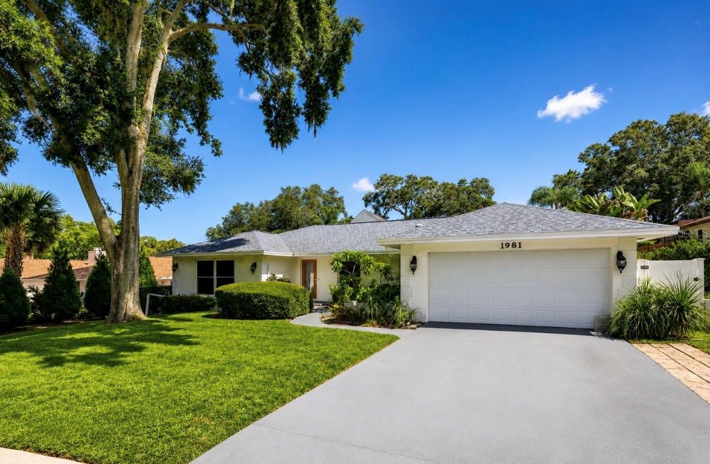 Photo of 1981 Castille Drive, Dunedin, FL 34698 (MLS # TB8532619)