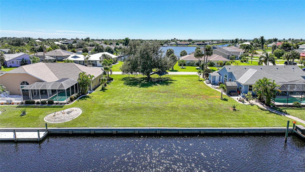 Photo of 17130 Galleon Terrace, Port Charlotte, FL 33948 (MLS # C7532424)