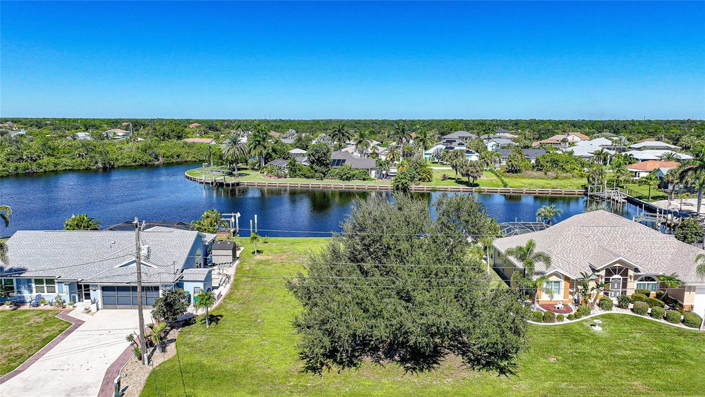 Photo of 17130 Galleon Terrace, Port Charlotte, FL 33948 (MLS # C7532424)