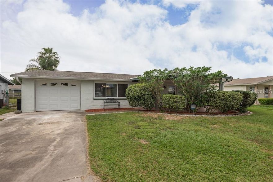 Beautiful 2 Bedroom 2 Bathroom home has all your amenities and entertainment close by. It features a kitchen with a breakfast bar, a formal dining room, a screened-in Florida room, a fenced back yard, walk-in closets, a New A/C, a new Water heater, and New flooring. Come Make this home yours.