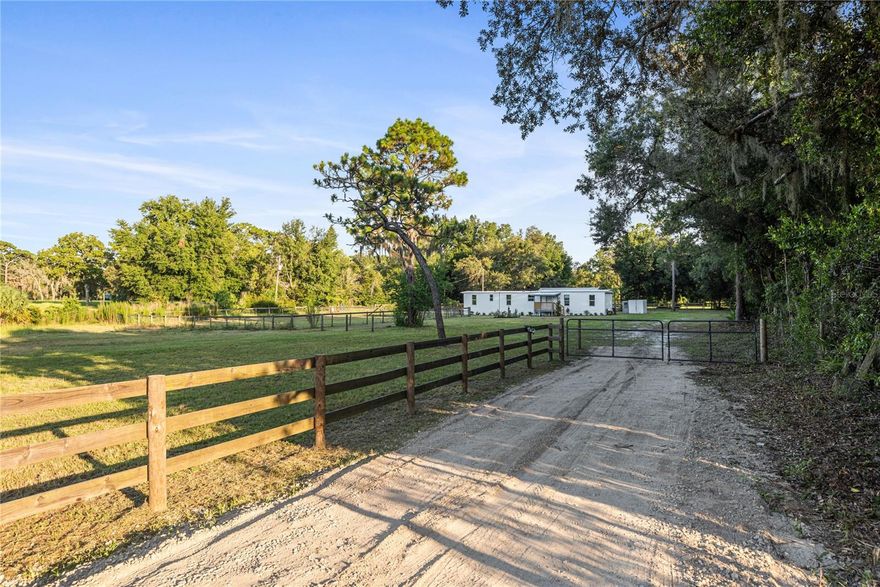 There’s space for your horse! Fully remodeled, upgraded, and move-in ready, this gorgeous country-living home offers the perfect blend of peaceful privacy and modern convenience. Located in a quiet neighborhood just a couple miles east of US-19, this property has room for your hobbies, tools, recreational toys, RV, and boat—bring it all! Sitting on a beautifully fenced yard, this home features a fully updated interior. Enjoy remodeled cabinets, new countertops, and all-NEW appliances in a kitchen designed for the chef in your family. Both bathrooms have been completely updated as well. Step outside onto the open deck, sip your morning coffee or evening wine, and enjoy the peaceful views of your property. This home offers the best of both worlds: the serenity of country living with the convenience of Walmart, Publix, Dunkin Donuts, the Suncoast Parkway, and Tampa International Airport all within easy reach, Inside, the home features an open floor plan, a brand-new kitchen with NEW appliances, and NEW butcher-block counters that add rustic farmhouse charm—beautiful, durable, and eco-friendly. Enjoy new cabinets, remodeled bathrooms with upgraded faucets and fixtures, new laminate flooring, and freshly painted interior and exterior. Don’t forget to check out the BARN/Garage—perfect for storage, projects, hobbies, or workspace. This renovated home is in an excellent location and just a short drive to some of Florida’s best fishing spots. When you’re not out exploring Citrus County’s incredible amenities, you’ll love relaxing in your very own private oasis. Hurry—make your appointment today to tour this phenomenal home.
Home is sold As-Is with no warranties expressed or implied.
Information contained herein is deemed reliable but subject to change without notice.