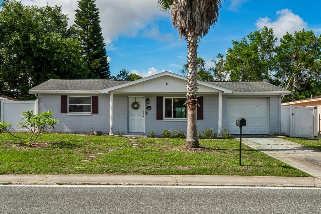 Photo of 7024 Fox Hollow Drive, Port Richey, FL 34668 (MLS # W7886257)