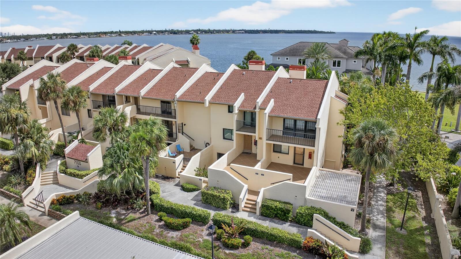 Under Construction. Incredible opportunity to own a waterfront condo in the desirable South Bay community, with stunning views of Tampa Bay and direct ocean access! This 2-bedroom, 2-bathroom ground floor unit is currently under renovation and presents a rare chance to customize your dream coastal retreat. Enjoy expansive water views, resort-style amenities including a sparkling community pool, and private dock access just steps from your door. The unit offers a spacious floor plan, private patio spaces, and large sliders that let in abundant natural light. Located minutes from vibrant downtown St. Petersburg, major highways, and some of Florida’s best beaches, this condo is ideal for full-time residents, seasonal living, or investment potential. Don't miss your chance to create a personalized waterfront oasis in one of the most scenic and convenient locations in the Bay Area!