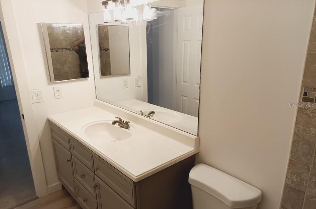 Photo of 3157 Yorych Lane, Orlando, FL 32822 (MLS # A4686285)