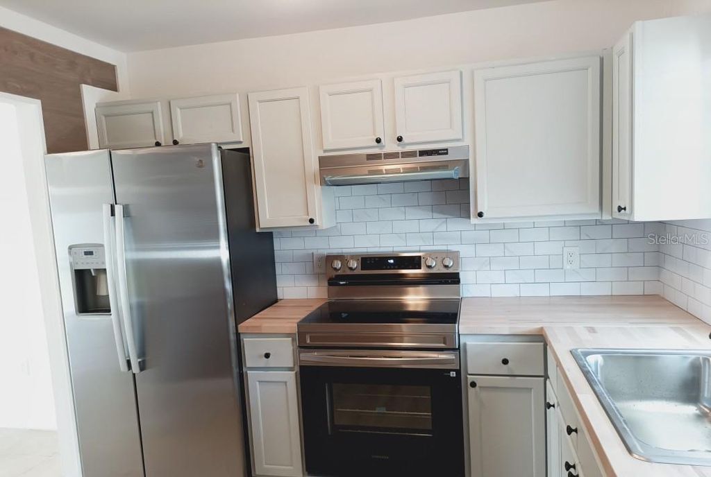 Photo of 3157 Yorych Lane, Orlando, FL 32822 (MLS # A4686285)